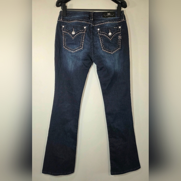 NEW MISS ME MID-RISE BOOTCUT JEANS. - Picture 3 of 8